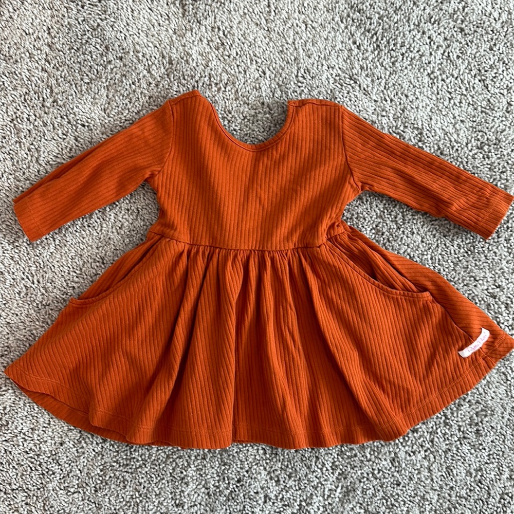 RuffleButts Toddler Girl Long Sleeve Twirl Dress in Rust